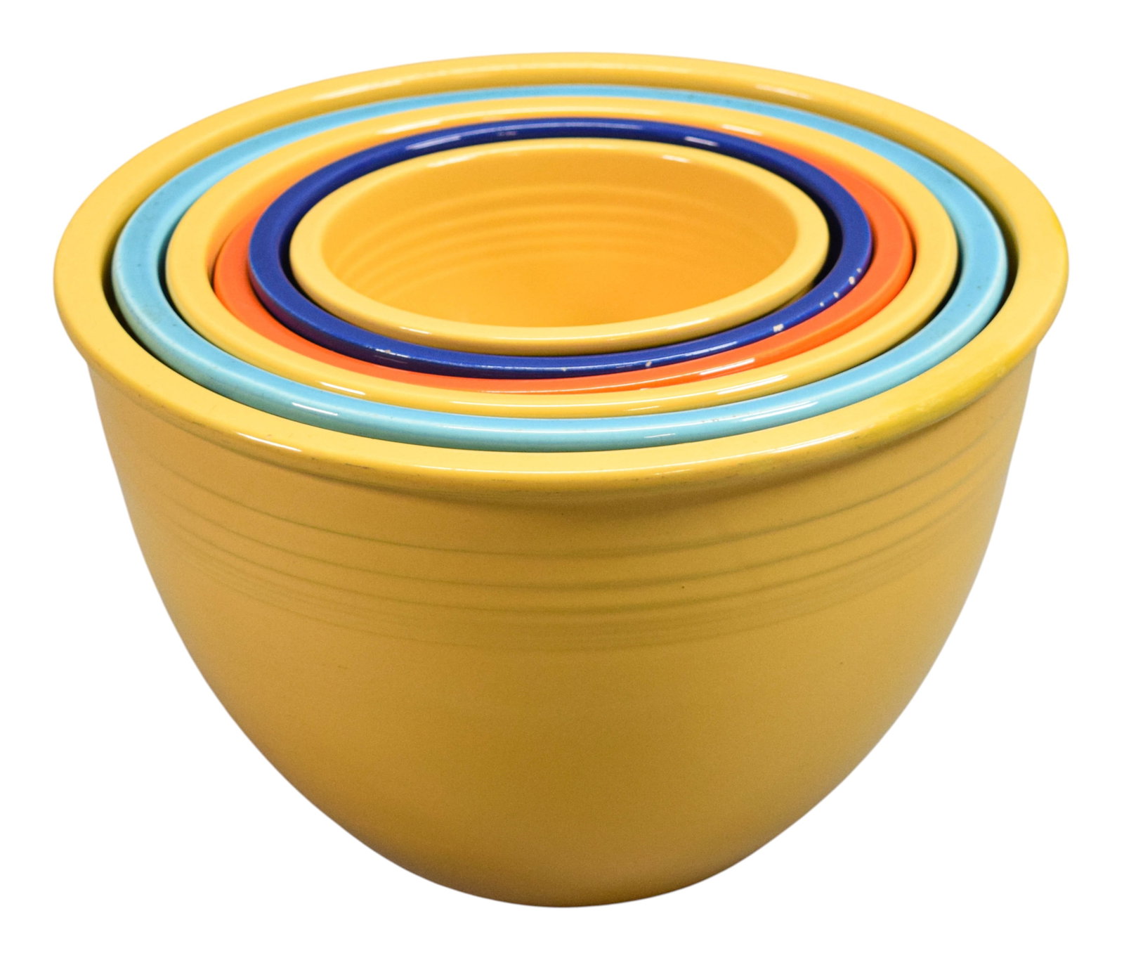 Fiesta Ware Pottery Nest of 6 Bowls: Set of 6 vintage Fiesta pottery nesting bowls. Daffodil (yellow), turquoise, daffodil, poppy (orange), blue, daffodil. All marked Fiesta on the undersides. Largest 7"H x 11"-diameter. All with scratch