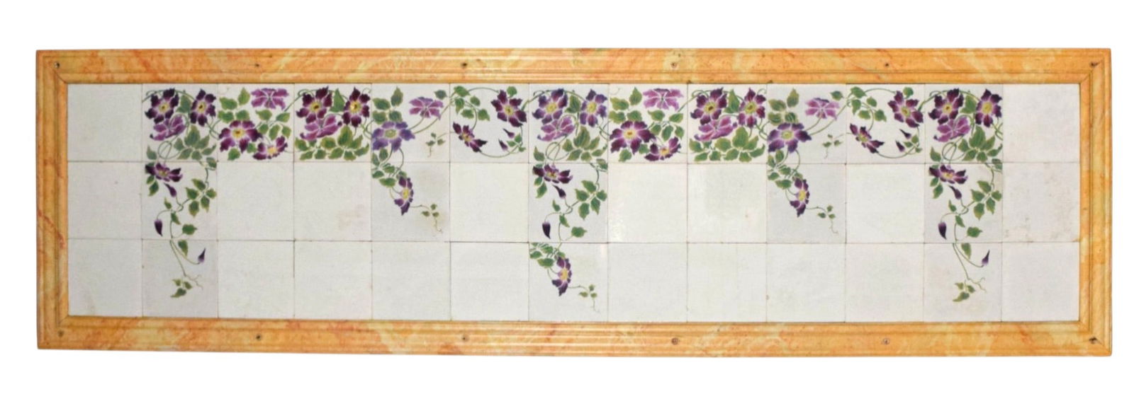 Large Decorative French Ceramic Floral Tile Panel: Large decorative tile panel with continuous hand-painted floral motif on white glazed ground. Mounted onto plywood backing. Wood frame finished with faux-marble paint. 24" H x 83 1/2" L x 1 1/4" D. Cr