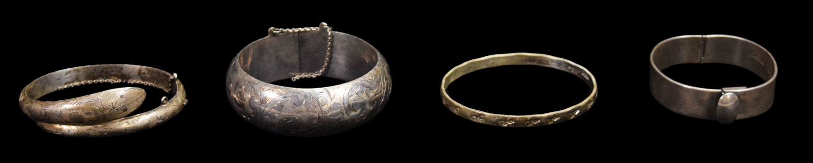 4 Sterling Bracelets: 4 sterling silver bracelets. Modernist bracelet, signed illegibly and dated 85; bracelet with scrolling motif, marked Siam; snake bracelet, unsigned; bangle with geometric design, marked Mexico. Snake