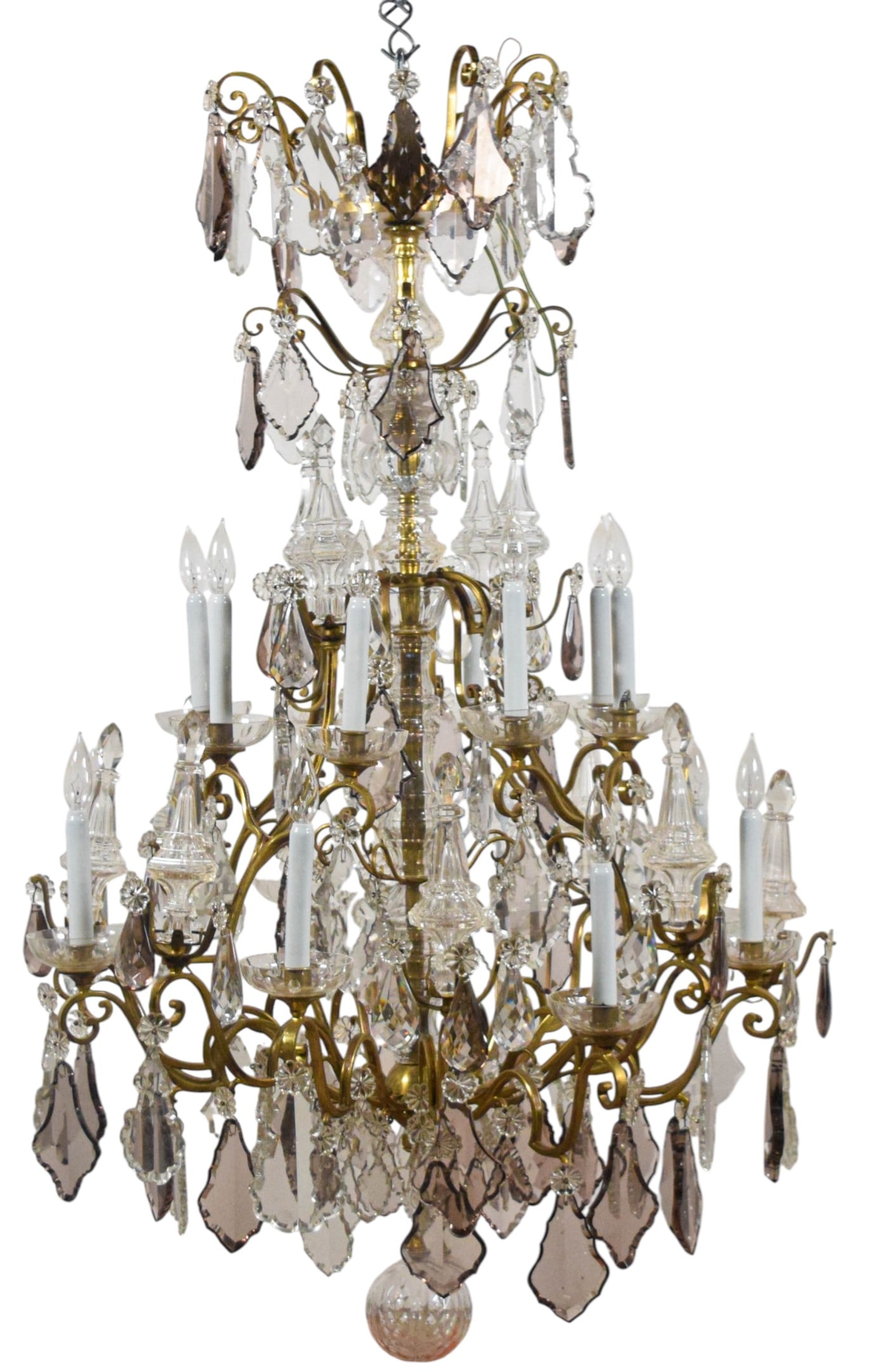 Baccarat Style 16 Light Crystal Chandelier: Louis XV style 16 light gilt metal and crystal chandelier. Chandelier 58 1/4"L as photographed, including drop; 35"-diameter. One bobeche cracked, 3 bobeches with chips and flakes to the rims, one bob