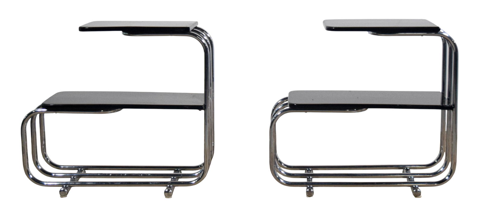 Pair of Alfons Bach for Lloyd Loom Side Tables: Alfons Bach for Lloyd Loom. Pair of art deco side tables. Black lacquered wood and chrome. Each 23 3/8"H x 25 1/2"L x 12"W. Both with scratches to both tiers, chips to lacquer along edges, some rustin