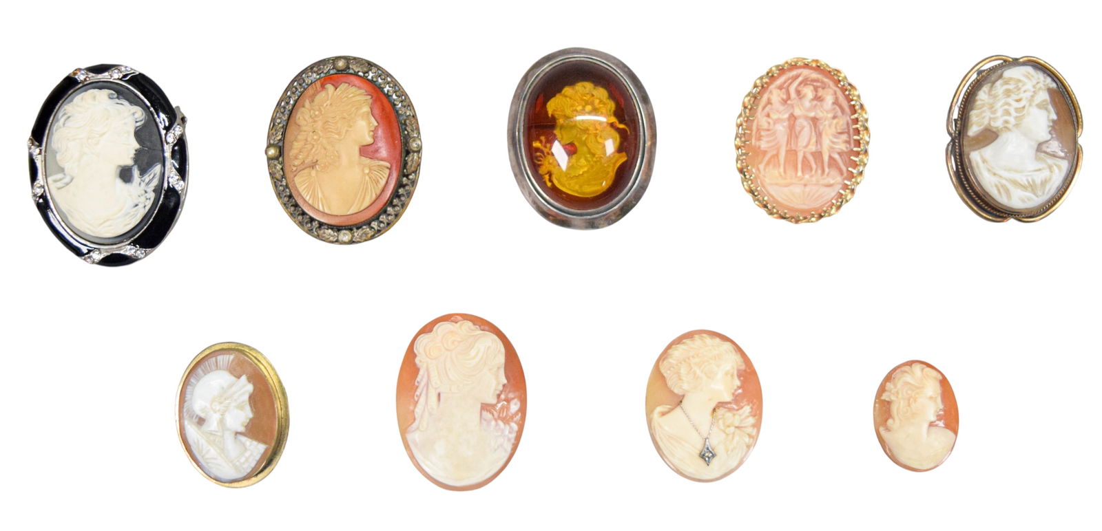 9 Cameos Including Sterling: Group of 9 cameos. 3 pins, 3 pin / pendants, and 3 unmounted. Cameo with amber in hallmarked sterling silver frame, 17.5 grams total. Largest 1 7/8"L. 1 silver tone cameo missing stones from frame and