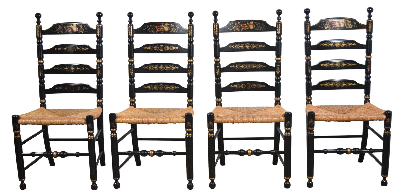 Set of 4 Signed Hitchcock Chairs: Set of 4 Hitchcock chairs. Rush seat ladderback chairs with stenciled gilt decoration. All signed L. Hitchcock. Each 41 1/2"H x 19 1/2"W x 20"D, seat height 18 1/2"H. All with chips and paint loss to
