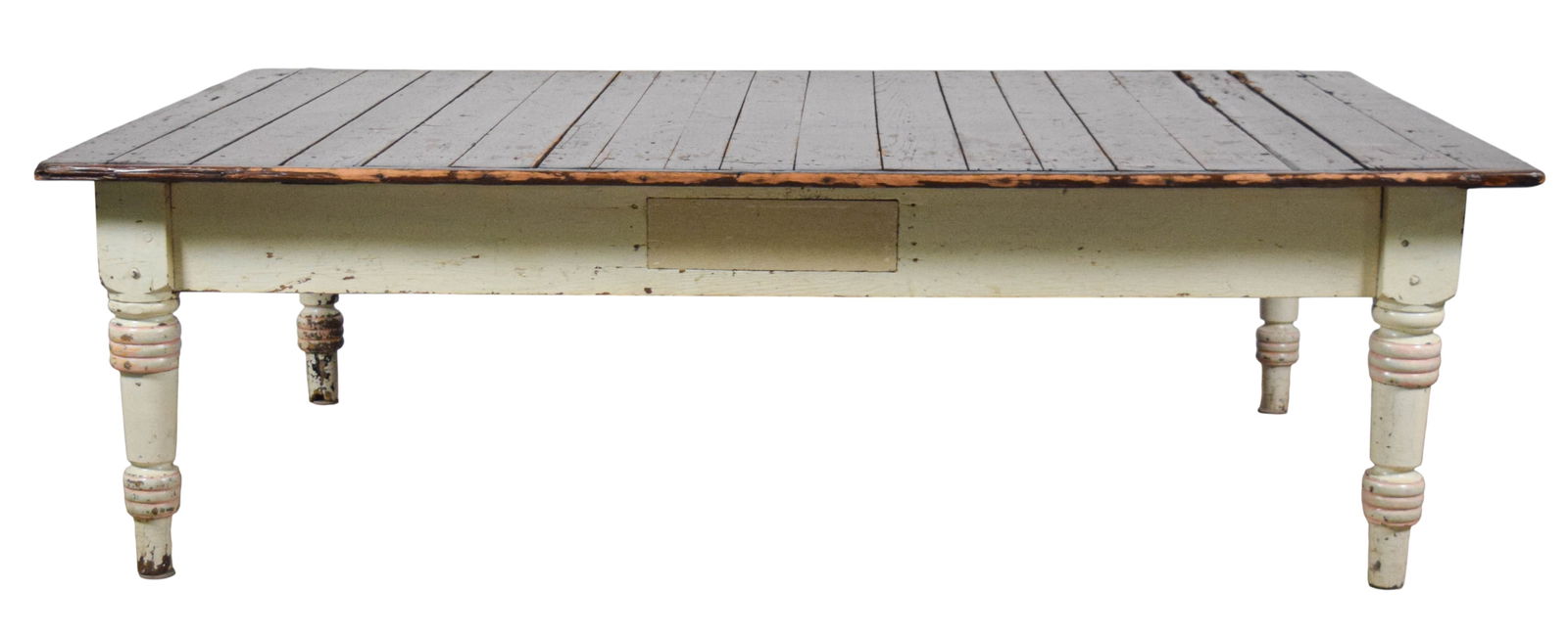Farmhouse Coffee Low Table: Farmhouse Coffee Low with dark stained finish. Rectangular top constructed from wide planks supported by simple apron and four stout turned legs. Base and legs retain heavily distressed painted finish