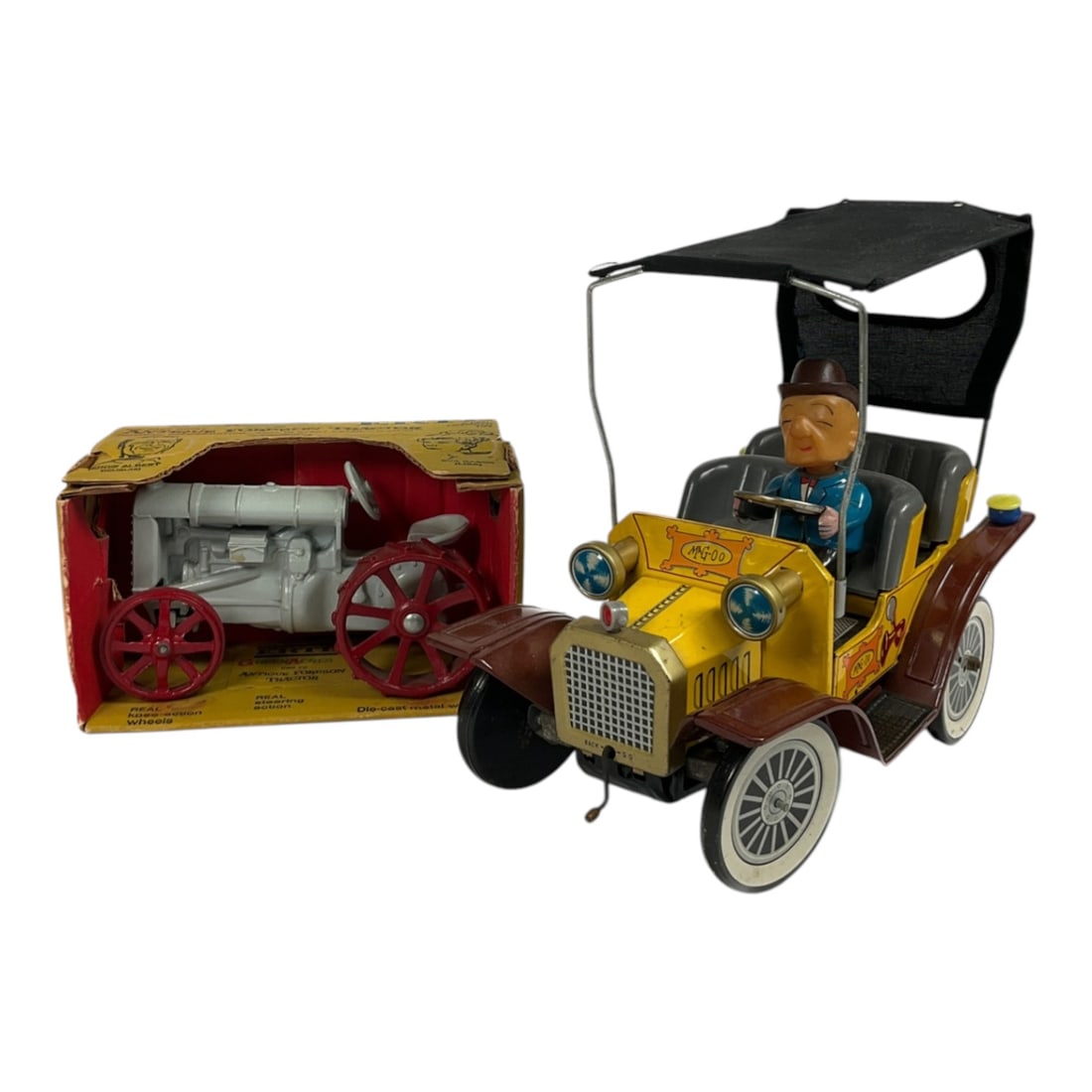 1961 Hubley Mr. Magoo Car & Ertl Fordson Tractor: Two vintage toys including a 1961 Hubley battery operated "Official Mr. Magoo Car" and an Ertl "Antique Fordson Tractor." Both include original boxes. Hubley car has not been teste
