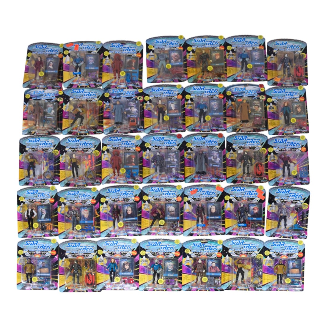 35 Star Trek: The Next Generation Action Figures: Group of 35 early 1990s Star Trek: The Next Generation action figures manufactured by Playmates Toys. Features a comprehensive range of characters from the television series, including main bridge cre