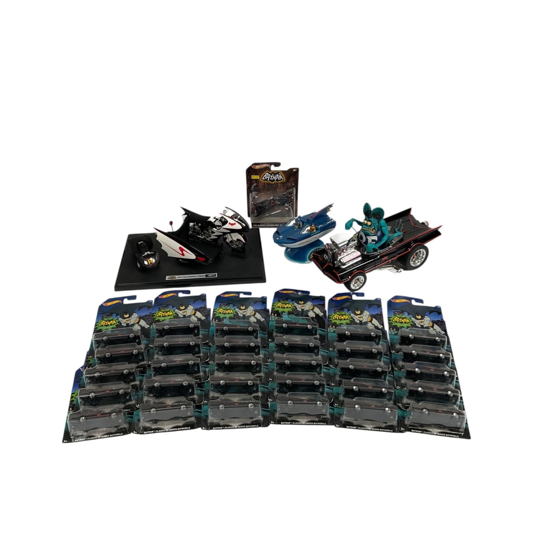 Group of Batman Memorabilia Incl 30 Hot Wheels: Assorted Batman memorabilia including 30 Hot Wheels Batmobile toy cars, a Mattel Hot Wheels Elite 1966 TV Series Batman Batcycle and Sidecar die-cast model, a Batboat model, and a custom model of the