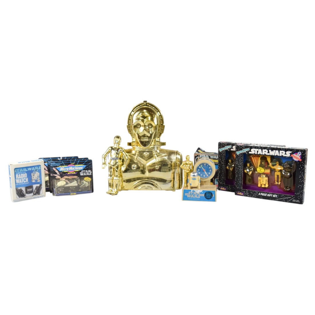 10 pieces - Kenner, Bradley, and Galoob Star Wars Memorabilia Collection, 1977-1993: This comprehensive collection of Star Wars memorabilia spans the original trilogy era through the early 1990s franchise revival. The centerpiece is a vintage Kenner gold-tone plastic C-3PO action figu
