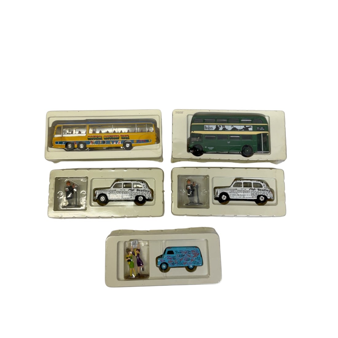 5 Corgi Classics Beatles Collection Die-Cast Model Vehicles: Group of 5 Corgi Classics die-cast model vehicles from The Beatles Collection series. Includes a yellow Bedford VAL Magical Mystery Tour bus, a green AEC Routemaster Liverpool Corporation