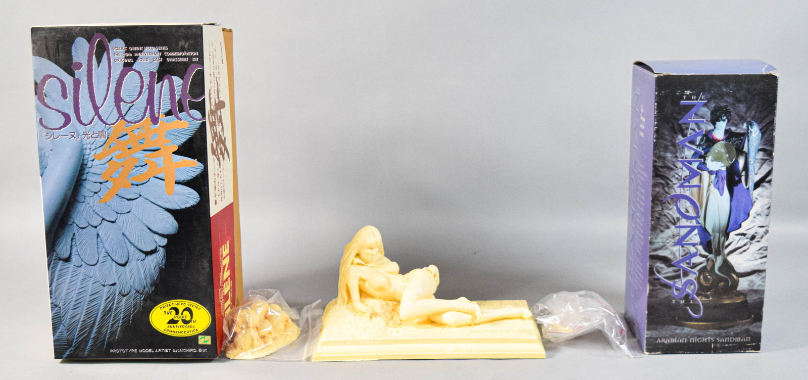 3 Collectible Model Kits Incl Volks Silene and Arabian Nights Sandman: Three collectible model kits and figures including a Volks Orient Hero Series 20th Anniversary Commemoration unpainted solid cast resin model kit of Silene from the Devilman series, designed by artist
