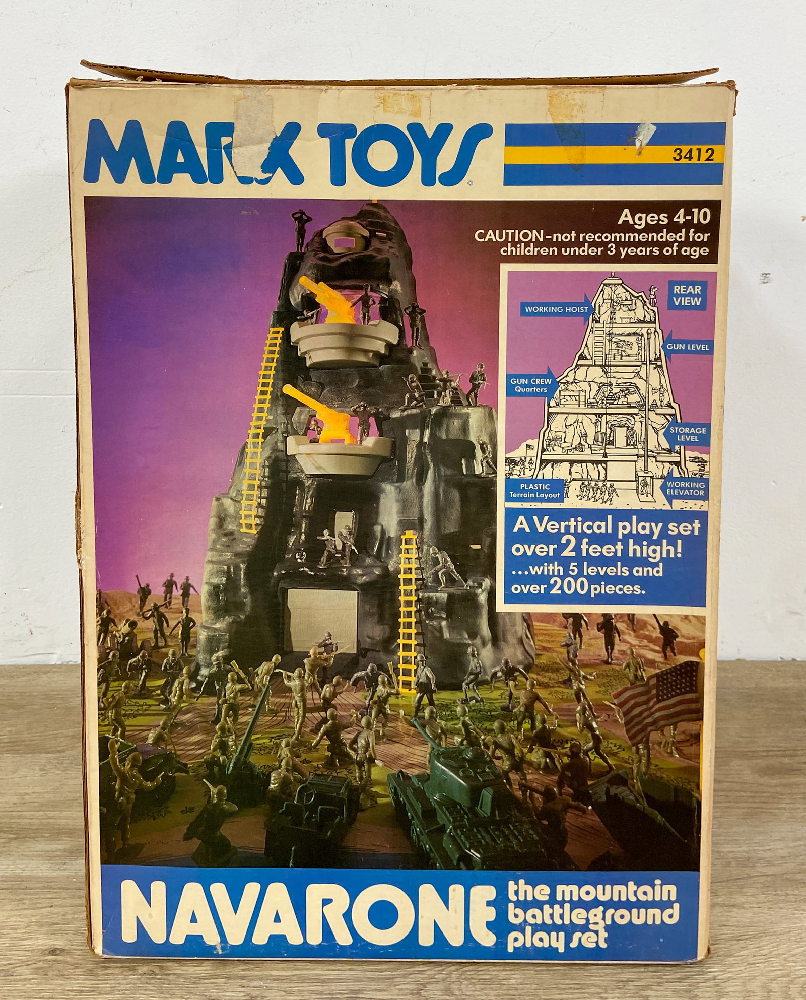 Marx Toys Navarone Mountain Battleground Play Set Model 3412 c. 1970s: Marx Toys Navarone: The Mountain Battleground Play Set in original box. Large-scale vertical playset with five internal play levels, including gun crew quarters and storage areas. Interactive elements