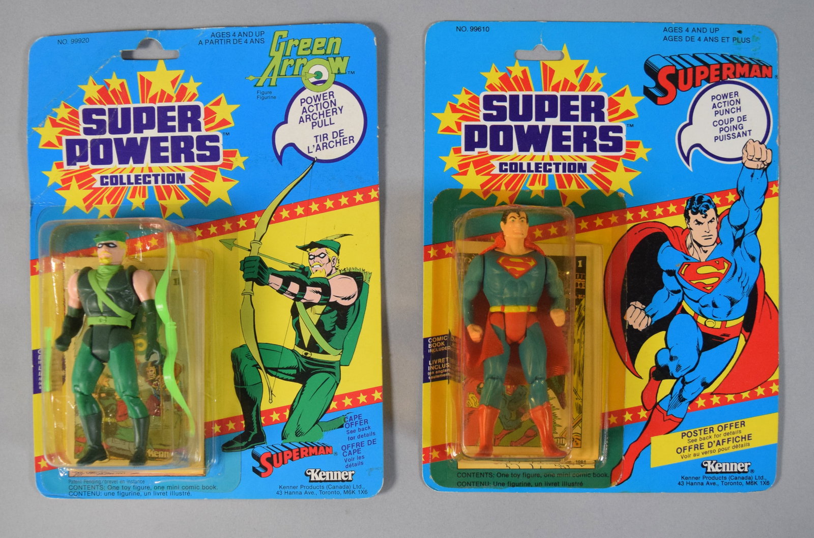 2 Kenner Super Powers Action Figures Incl Superman and Green Arrow: Two vintage DC Comics action figures from the Kenner Super Powers Collection, featuring Superman and Green Arrow. Both items are in their original bilingual English and French blister packaging as pro