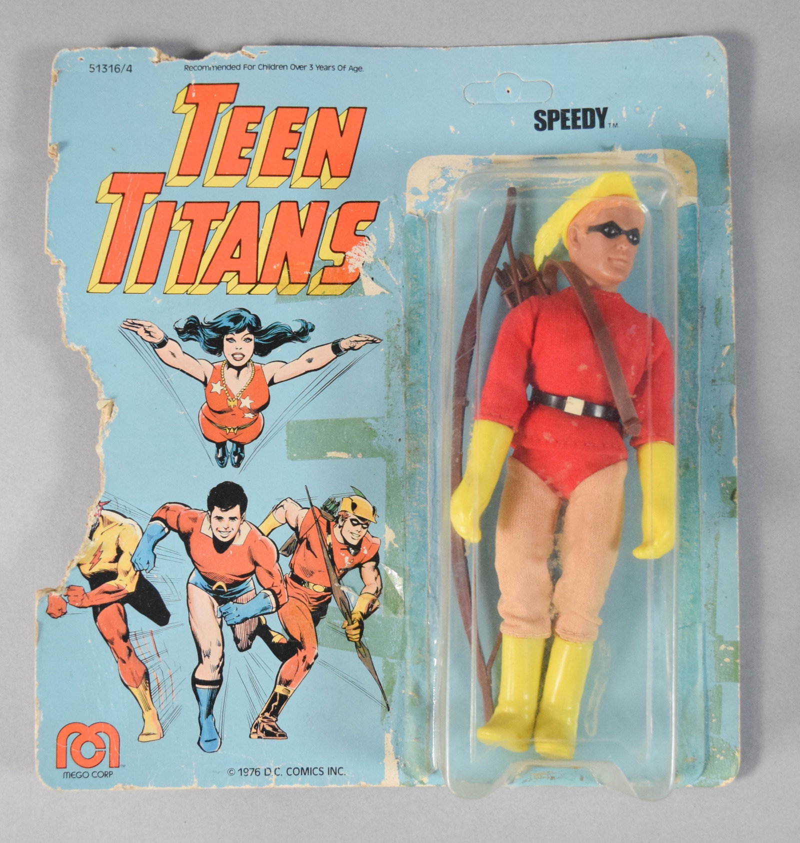 Mego 1976 Teen Titans Speedy Action Figure: Mego 1976 "Speedy" action figure from the Teen Titans series including bow and quiver accessories housed in original blister packaging. 10" H x 7" W x 1.5" D