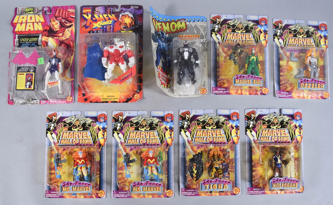 10 Toy Biz Marvel Action Figures c. 1992-1997: Collection of 10 vintage Marvel Comics action figures manufactured by Toy Biz during the 1990s. Includes figures from various retail lines, notably the Marvel Hall of Fame: She-Force series, Iron Man,