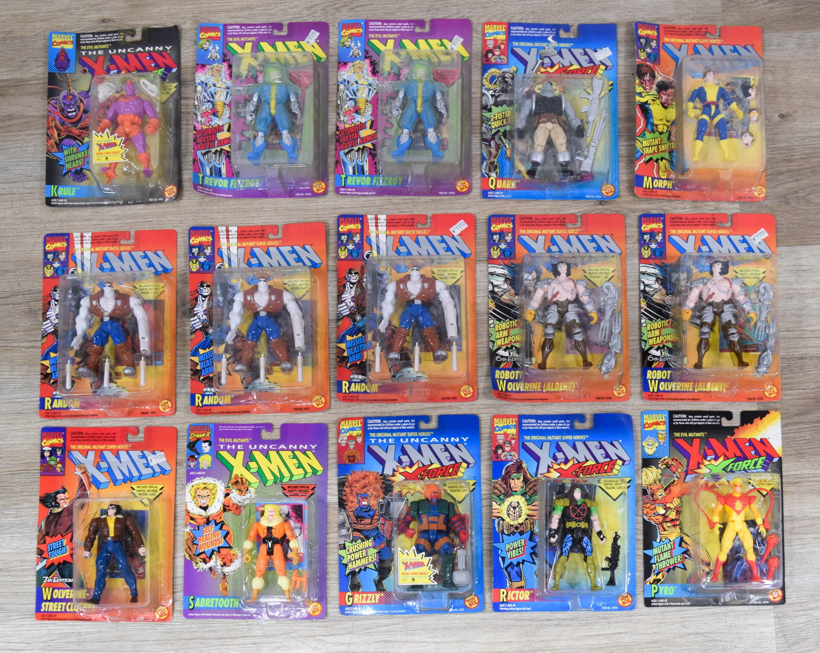 15 Toy Biz Marvel Comics X-Men and X-Force Action Figures: Collection of 15 articulated action figures produced by Toy Biz featuring characters from the Marvel Comics X-Men and X-Force franchises. The assortment includes figures of Krule, Trevor Fitzroy, Quar