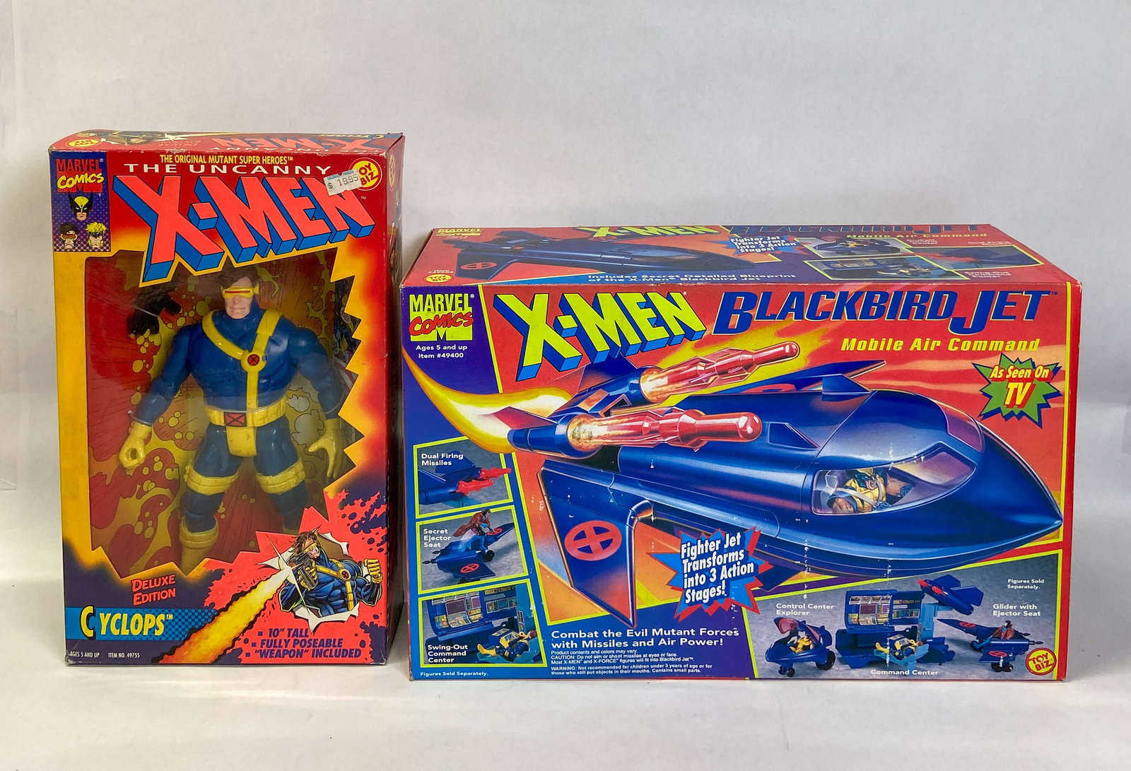 Toy Biz Marvel X-Men Deluxe Cyclops and Blackbird Jet c. 1993-1994: Two vintage Marvel Uncanny X-Men toys manufactured by Toy Biz in the early 1990s. The first item is a 1993 Deluxe Edition Cyclops 10-inch action figure housed in its original window box. The second it