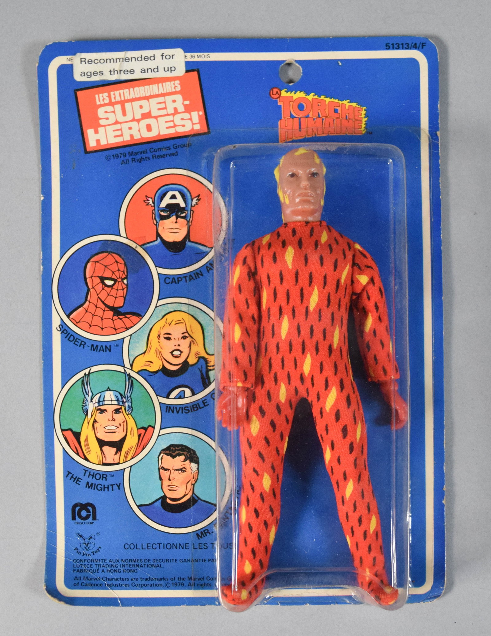 Mego 1979 La Torche Humaine Action Figure: Vintage 1979 Mego action figure of the Marvel character The Human Torch, titled La Torche Humaine for the French-market Les Extraordinaires Super-Heroes line. The 8-inch scale figure is dressed in a r