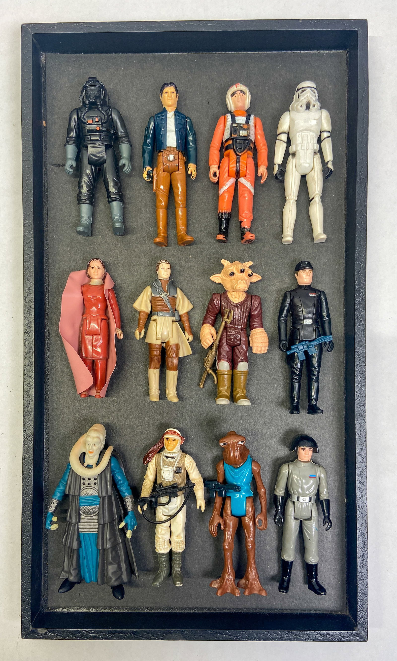 12 Vintage Kenner Star Wars Action Figures c. 1977-1983: Collection of 12 vintage Star Wars action figures manufactured by Kenner during the original film trilogy era. Includes a diverse selection of characters spanning the original film trilogy: Han Solo (