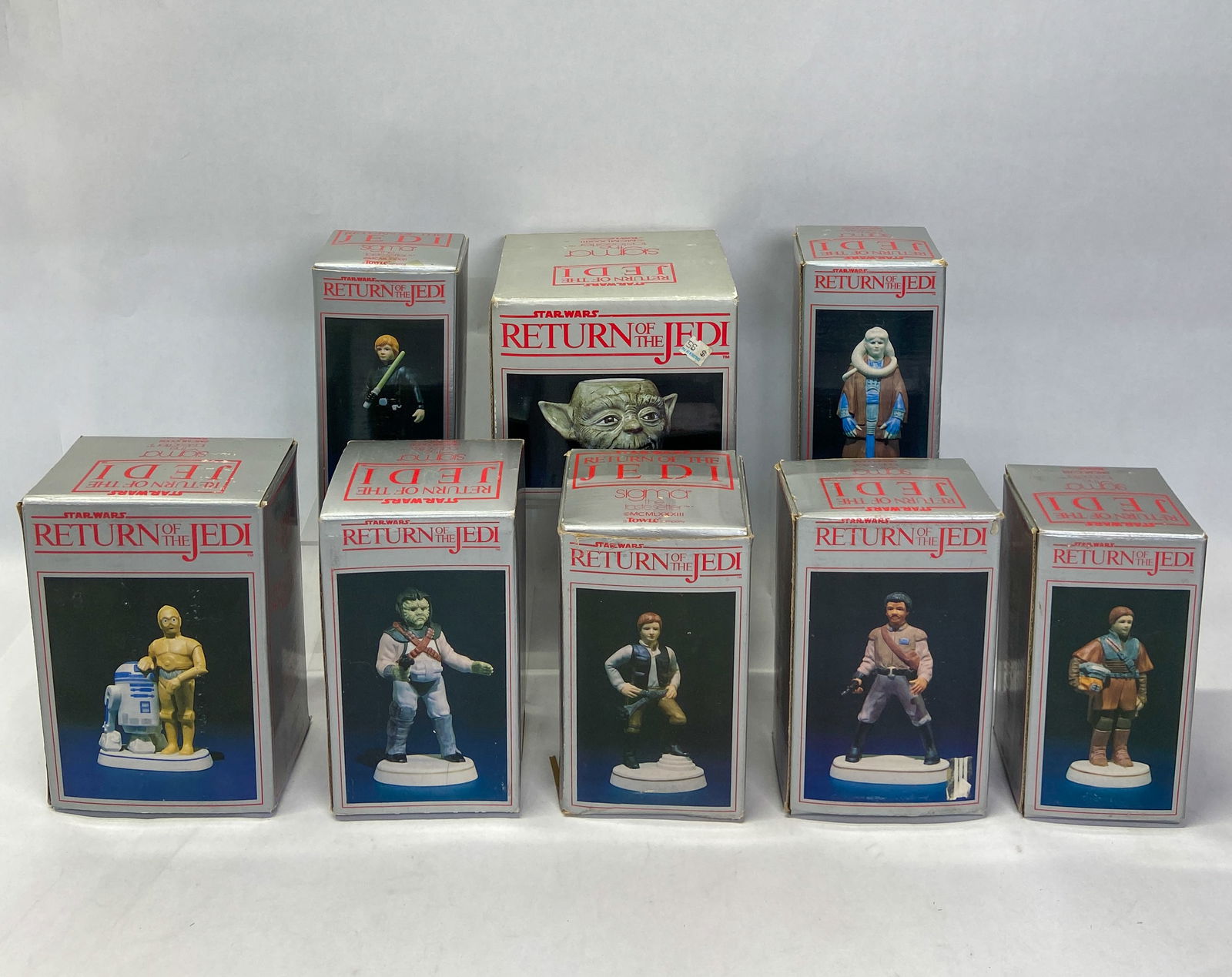 8 Sigma Tastesetter Star Wars ROTJ Porcelain Figurines 1983: Collection of Star Wars: ROTJ porcelain items produced by Sigma the Tastesetter in 1983. Includes seven hand-painted bisque porcelain figurines and one glazed ceramic character mug. The figurines depi
