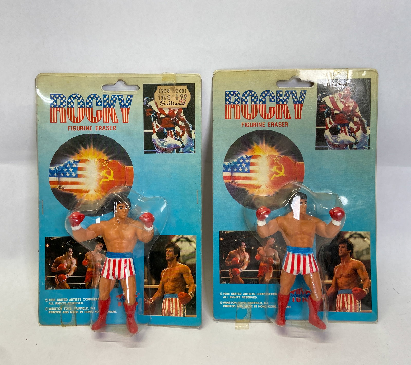 2 Rocky Figurine Erasers by Winston Toys 1985: 2 vintage Rocky figurine erasers manufactured by Winston Toys in 1985. Each figurine depicts Rocky Balboa in his signature patriotic stars-and-stripes boxing trunks, with both presented in their origi