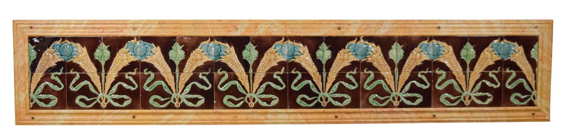 Large Art Nouveau Majolica Tile Panel: Large decorative architectural panel with Art Nouveau relief-molded majolica tiles. Mounted onto plywood backing. Wood frame finished with faux-marble paint. 17 1/4" H x 88" L x 1 1/4" 