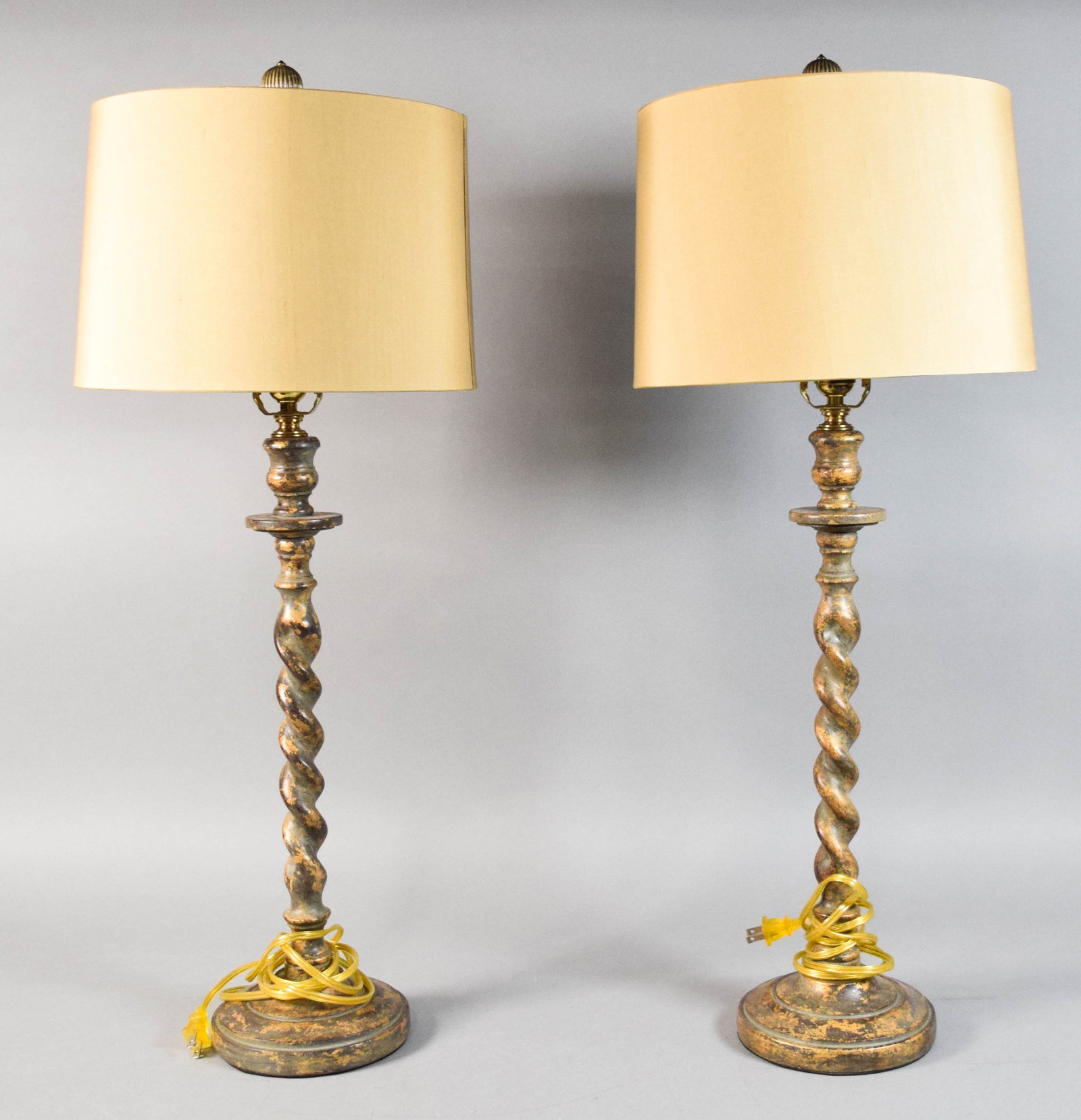 Pair of Barley Twist Table Lamps with Chelsea House Shades: Pair of barley twist table lamps with Chelsea House shades. Decorative finish with applied gold leaf accents. Knobs marked Leviton, made in USA. Tested and working. Overall 31 3/4" H x 6 3/4" base dia