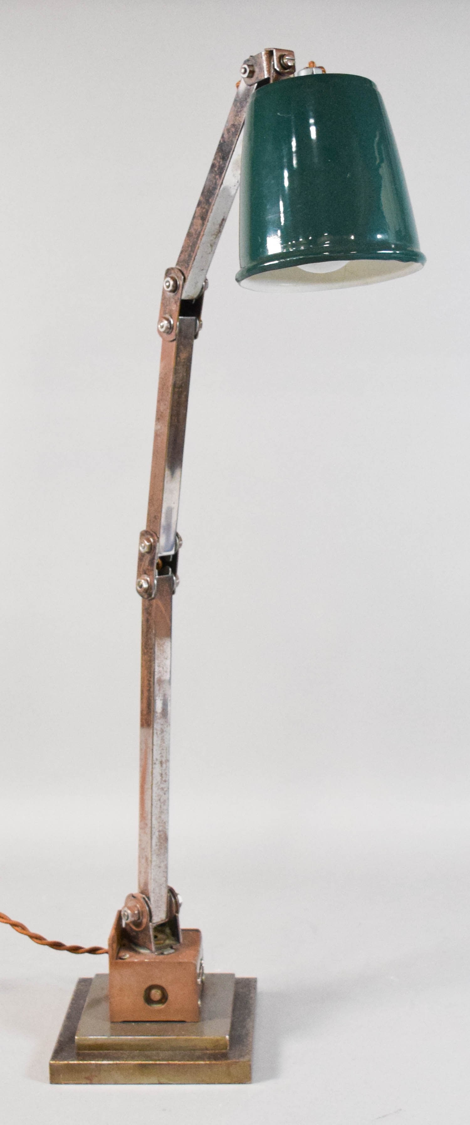 Memlite Industrial Articulated Task Lamp: Memlite industrial articulated task lamp with an enameled metal shade. Stamped Memlite on the arm. Tested and working. 32" H x 6 1/2" base diameter.