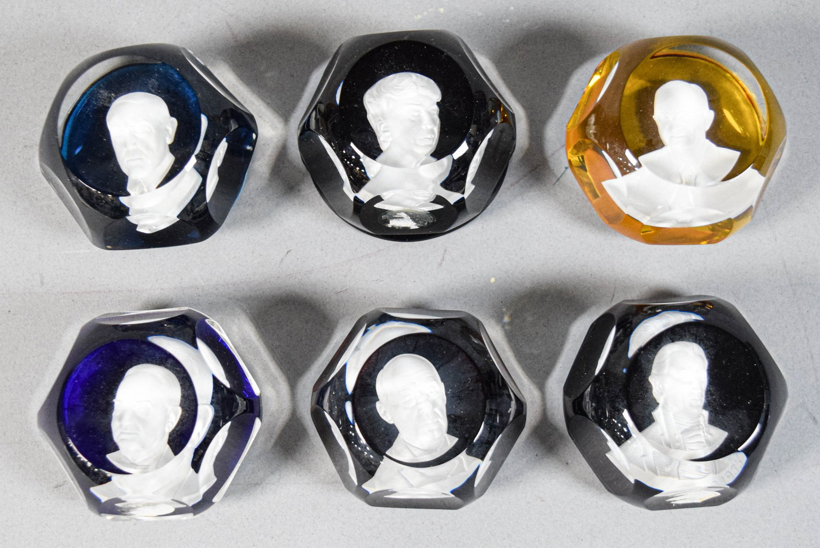 Set of 6 Baccarat Cameo Sulphide Paperweights: Set of six Baccarat crystal sulphide paperweights, each with a frosted glass cameo bust. Cameos include James Monroe, Calvin Coolidge, Eleanor Roosevelt, Harry Truman, Herbert Hoover, and Adlai Steven