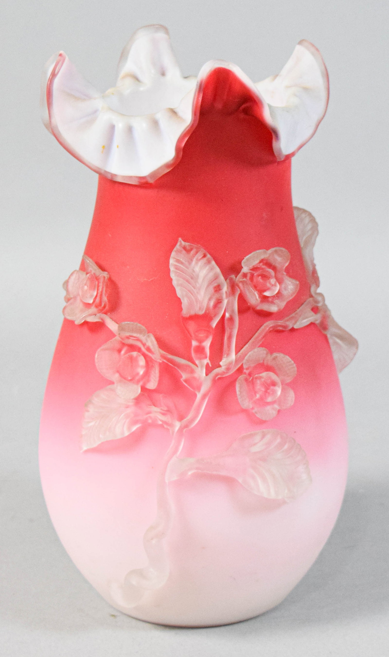 Victorian Shaded Rose to Pink Satin Glass Vase: Victorian shaded rose to pink cased satin glass vase with applied floral decoration. Pear-shaped body tapering to a fluted and ruffled rim. Smooth, ground-out pontil. 9 1/4" H x 4 1/2" base diameter.