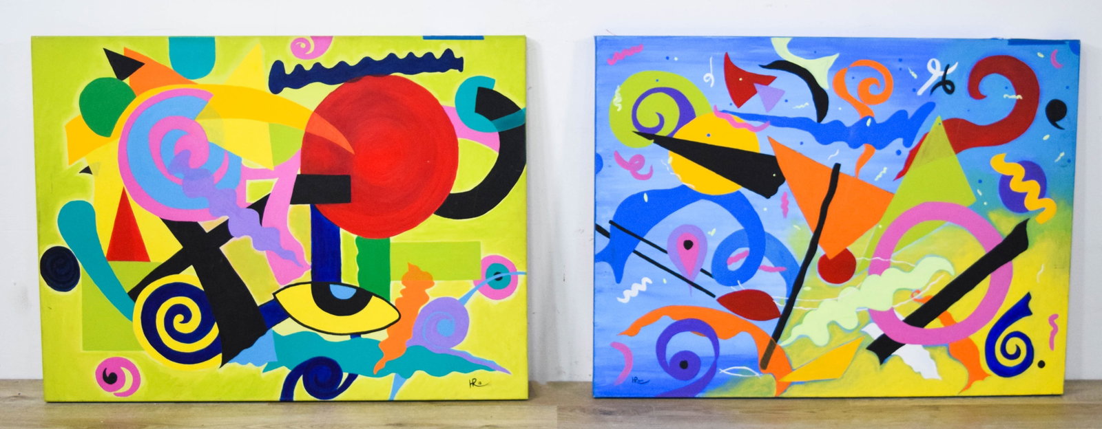Hugo Ruggiero Pair of Contemporary Abstract Acrylic Paintings: Pair of large-scale contemporary abstract paintings in acrylic on canvas. Both signed HR 2010 in the lower right. Signed Hugo Ruggiero on verso. Each 30 x 40 inches.