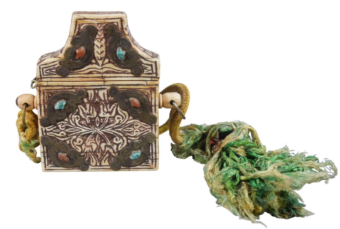 Quran Box With Camel Bone, Turquoise, Coral: Quran case, carved camel bone with turquoise and coral stones, silver tone mounts. Hinged lid. 8 1/4"H x 6"L x 1 3/4"W. Some splits to bone.