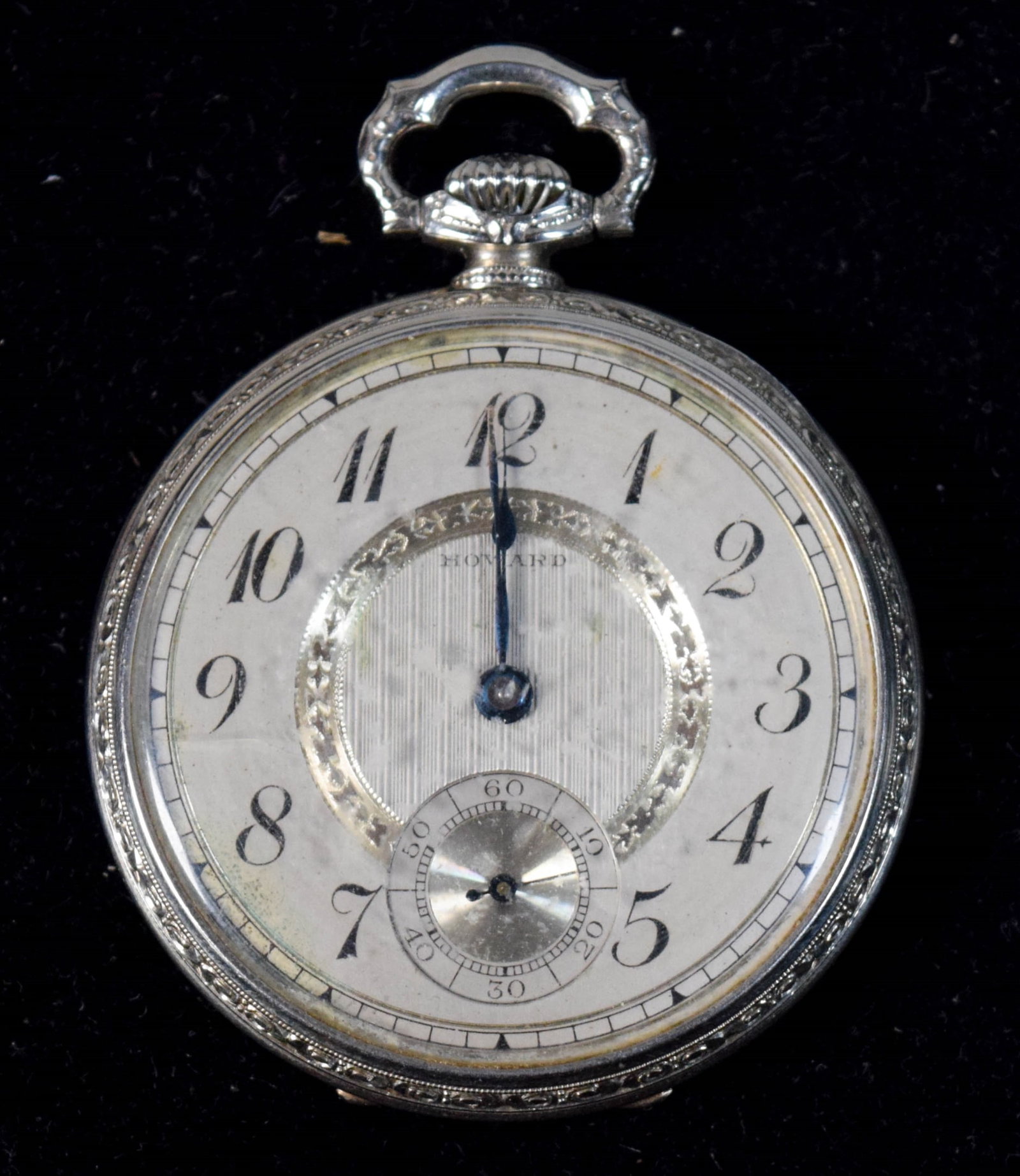 Howard 14k Gold Pocket Watch: Howard 14k gold open face pocket watch. Marked Howard on the dial and "E. Howard Watch Co." and "White Gold Guaranteed 14k 585 Fire The K. WC Co." on the case. Movement 38mm, case 1 3/4"-diameter. 50.