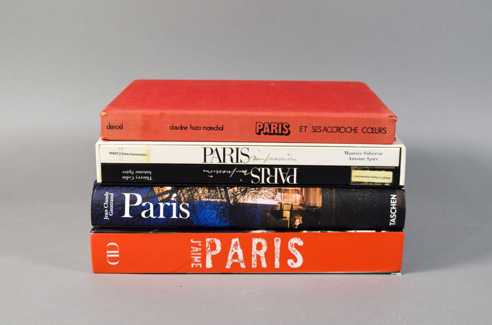 Group of 5 Paris Coffee Table Books and Photography Books: Group of five hardcover coffee table books on Paris. Includes J'aime Paris by Alain Ducasse; Paris: Portrait of a City by Jean Claude Gautrand; Paris Impressions by Maurice Subervie and Thierry Colin 