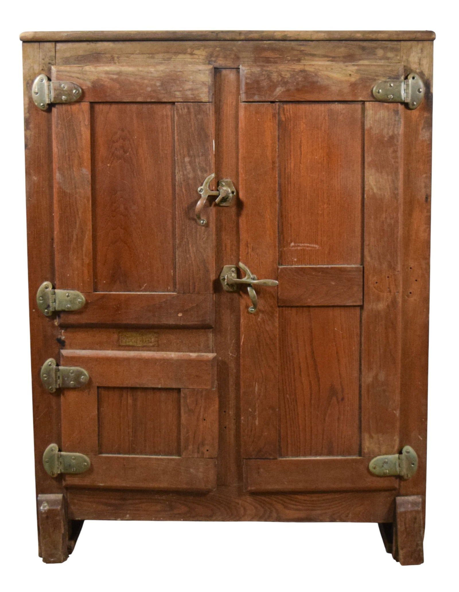 Frost King Oak Ice Box: Frost King oak ice box. 3 doors, interior wire shelves. Frost King label. 42 3/8"H x 31 1/2"W x 16 5/8"D. Scratches, splits and chips to wood throughout, bottom panel loose on one side,
