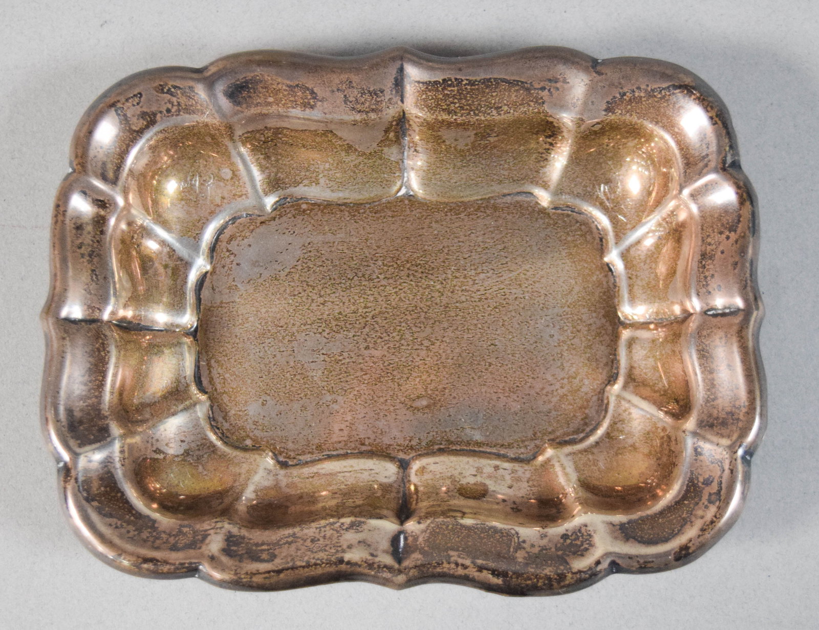Reed & Barton Sterling Silver Windsor Pattern Tray: Reed & Barton sterling silver tray in the Windsor pattern. Rectangular form with a decorative scalloped and fluted rim. Underside marked Reed & Barton, Sterling, model number X957, and Windsor