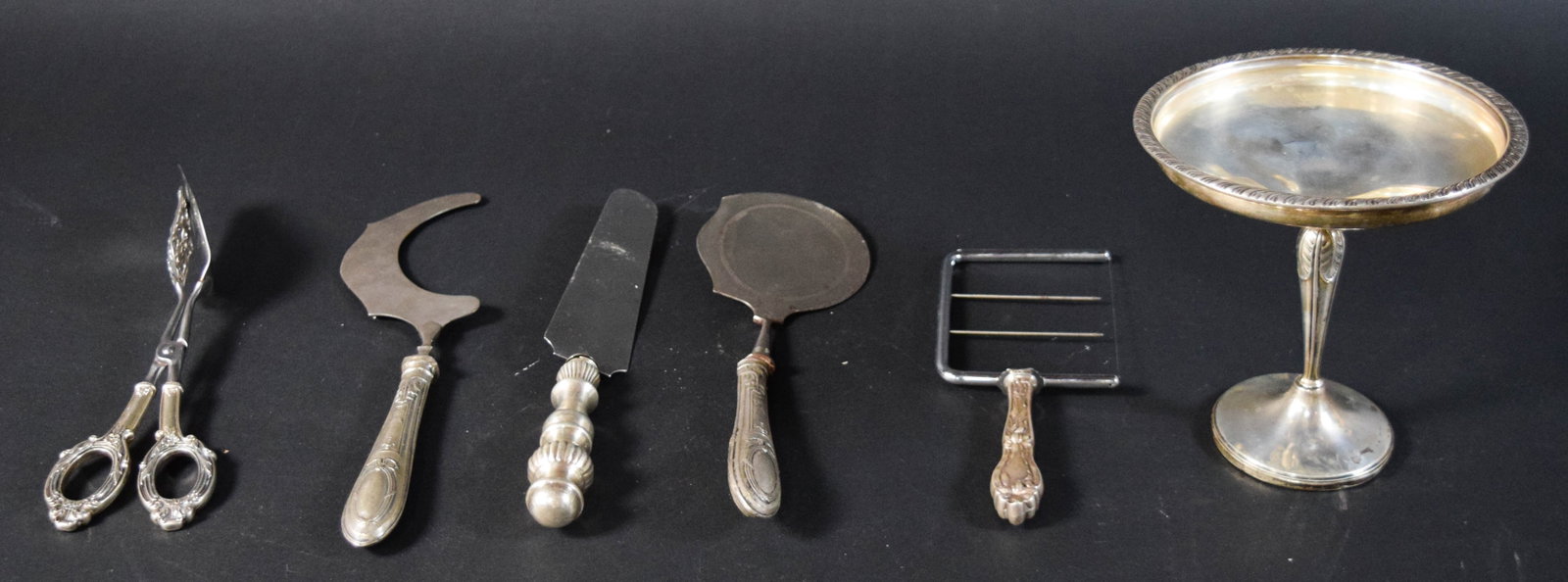 6 American and Continental Silver Serving Pieces: Group of six American sterling and Continental silver serving pieces. One weighted sterling pedestal compote by Hamilton Silver Co, marked "Sterling, Weighted, 414" on the underside. One pair of Webst