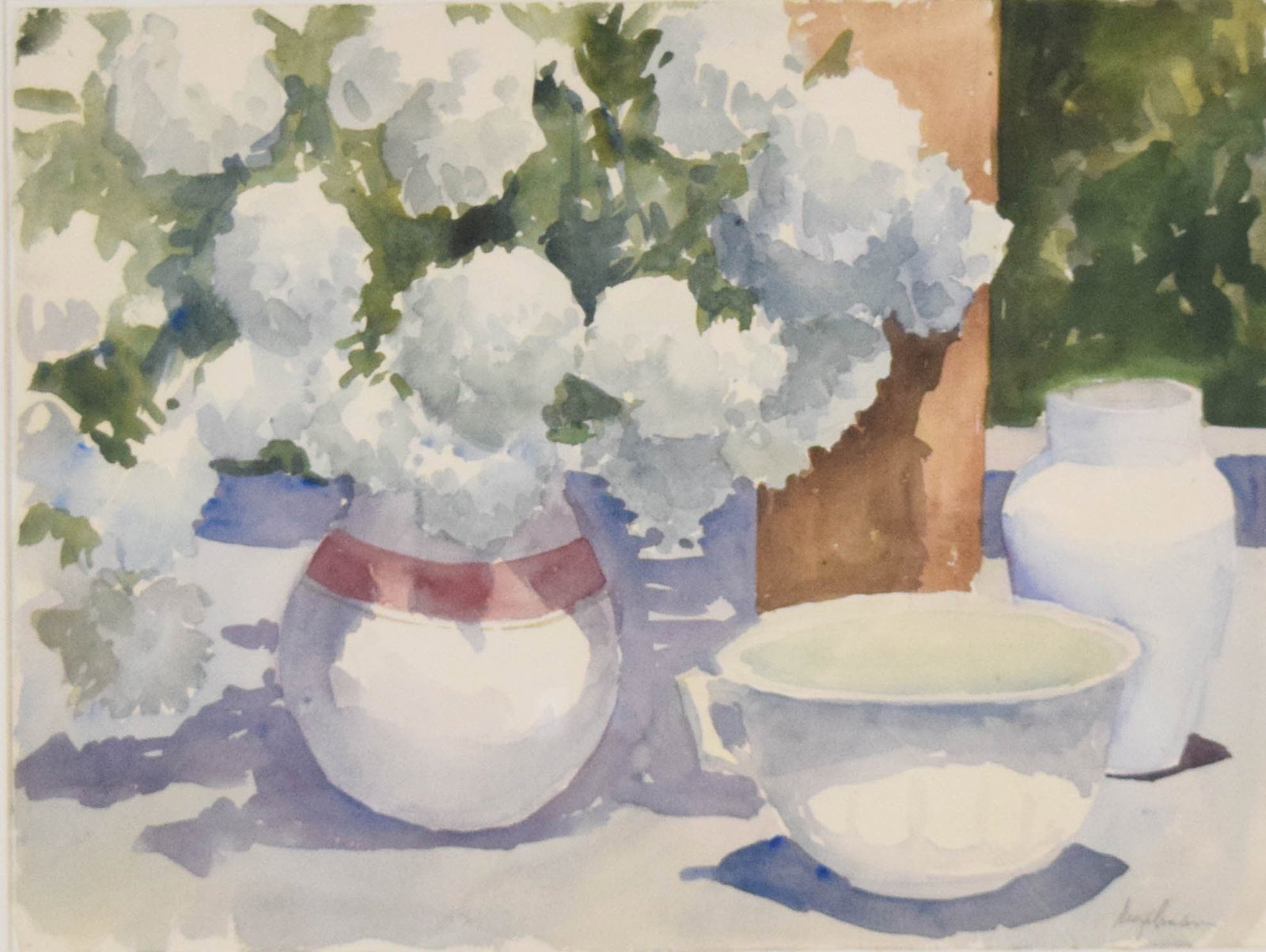 Richard Segalman, Watercolor Still Life with Hydrangeas: This watercolor on paper by American artist Richard Segalman (1934-2021) depicts a still life arrangement featuring a bouquet of white hydrangeas in a striped vase, an adjacent teacup, and a pitcher. 