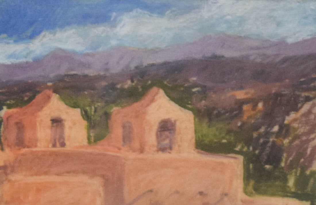 Richard Segalman (American, 1934-2021) Southwest Landscape Pastel: This pastel on paper by Richard Segalman depicts a sun-drenched landscape featuring two adobe structures in the foreground set against rolling mountains under a hazy blue sky. The work is executed in 