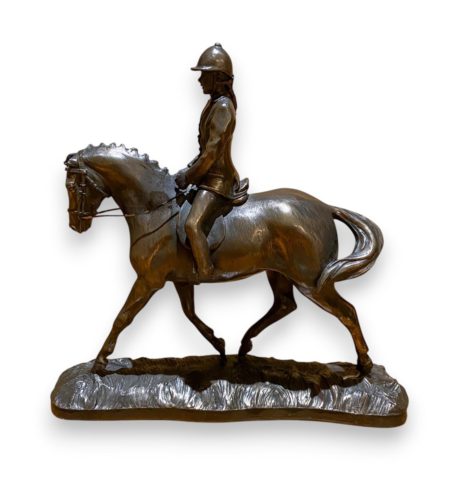 David Dutton for Genesis Fine Arts Equestrienne Sculpture: This contemporary cold-cast resin and bronze powder sculpture, produced by Genesis Fine Arts and designed by artist David Dutton in 2004, depicts a female rider in formal equestrian attire mounted on 