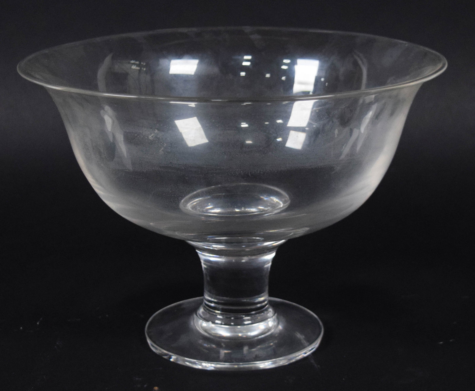 Ralph Lauren Landon Crystal Footed Serving Bowl: A large crystal serving bowl from the Landon collection by Ralph Lauren. The bowl is constructed of clear lead crystal and features a flared rim and a thick, solid pedestal foot with a polished base. 