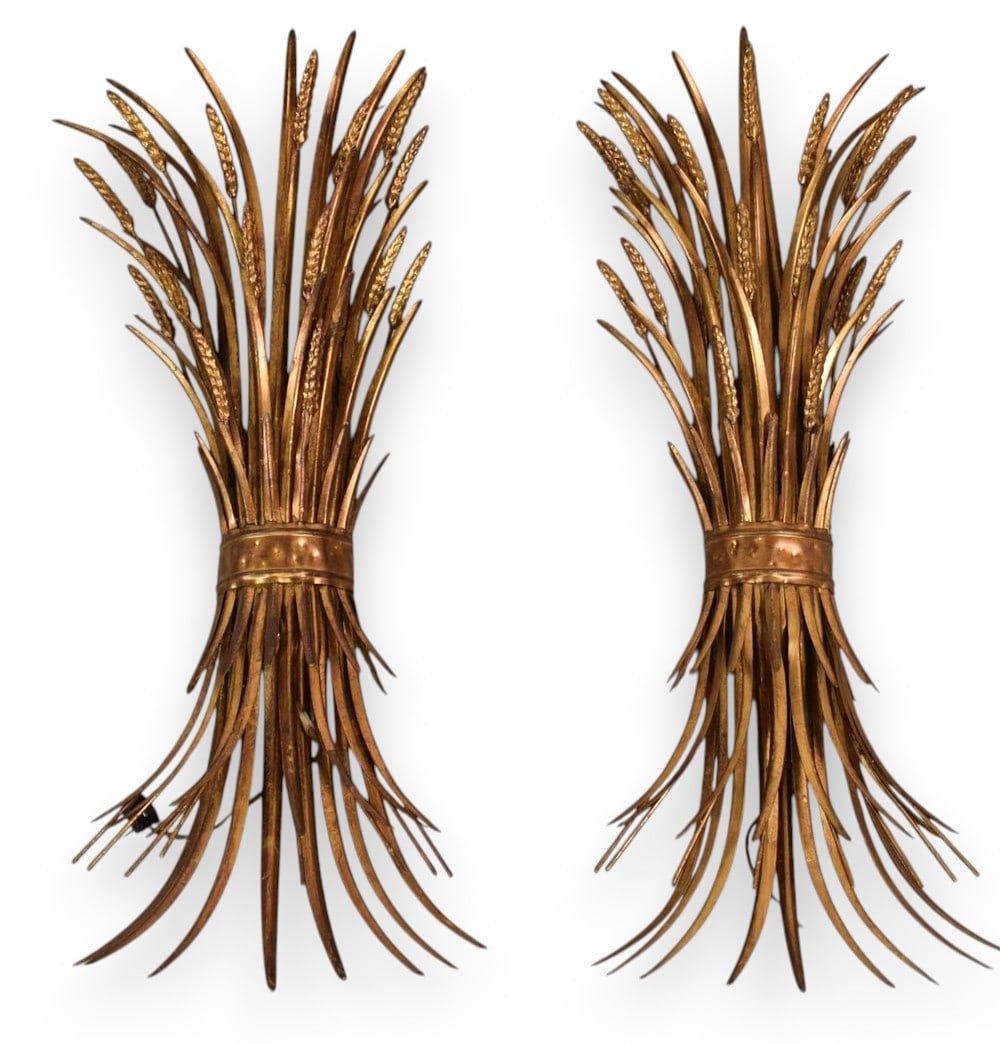 A Pair of Florentia Italian Gilt Metal Sheaf of Wheat Wall Sconces: A pair of two-light wall sconces manufactured by Florentia and handcrafted in Italy. The sconces are constructed from gilded metal, likely iron or steel, featuring a stylized sheaf of wheat motif gath