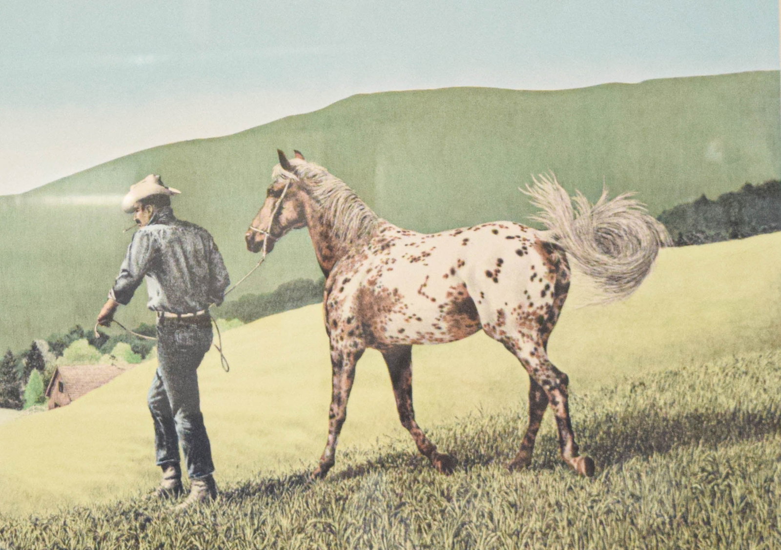 Neil Hunter Serigraph Appuloosa, 1974: This color screenprint titled Appuloosa was created by artist Neil Hunter in 1974. The artwork depicts a Western scene featuring a man in a denim shirt and cowboy hat leading a spotted Appaloosa horse