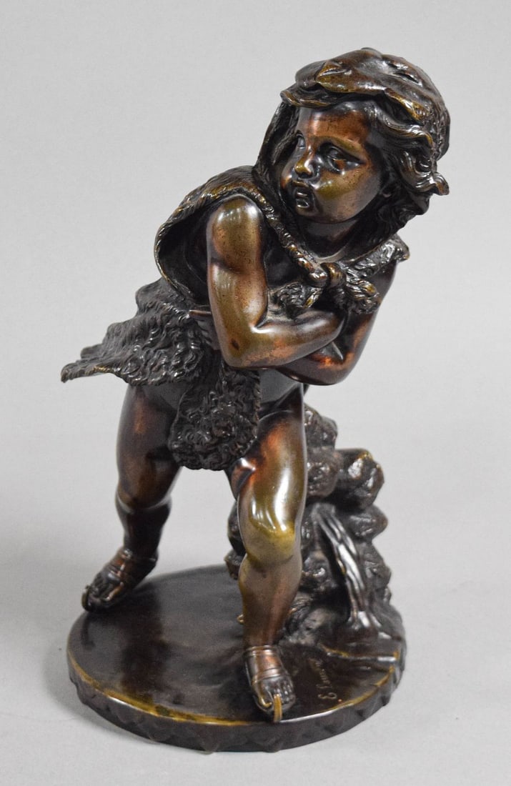 Eugene Laurent Bronze Sculpture Child Skating: Eugene Laurent (French, 1832–1898). Bronze sculpture, Child Skating. The work is cast in bronze with a rich brown patina featuring golden-brown highlights on the face, arms, and legs where the surfa