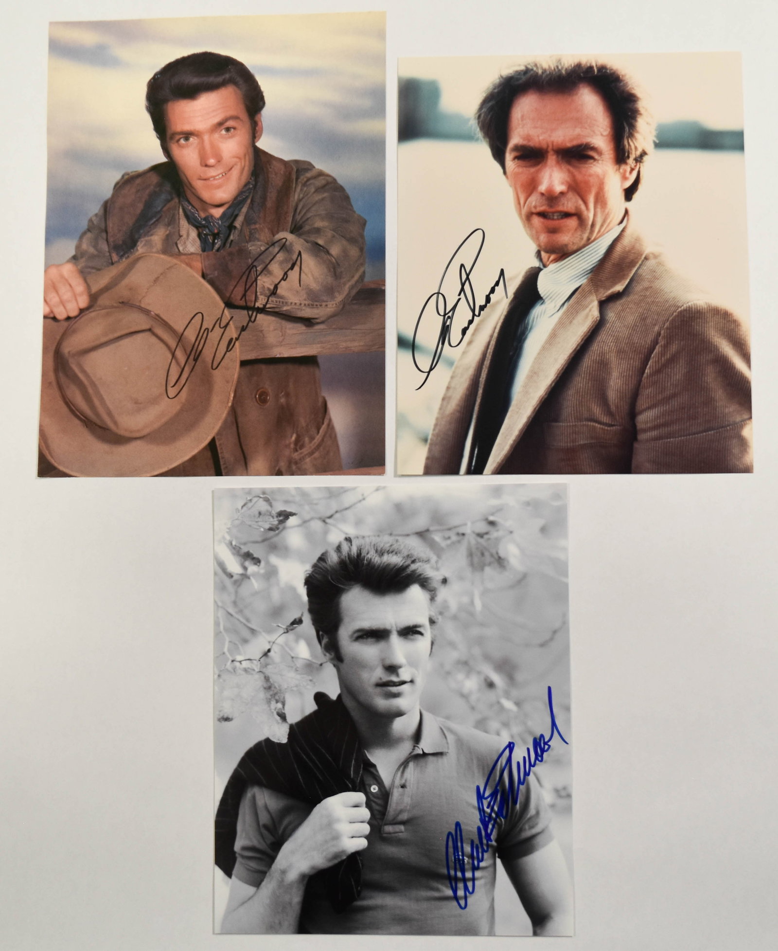 3 Clint Eastwood Autographed Photographs and Magazine Ephemera: A collection featuring three hand-signed 8 x 10 inch glossy photographs of actor and director Clint Eastwood, accompanied by a vintage magazine page. The first photograph is a color print of Eastwood 