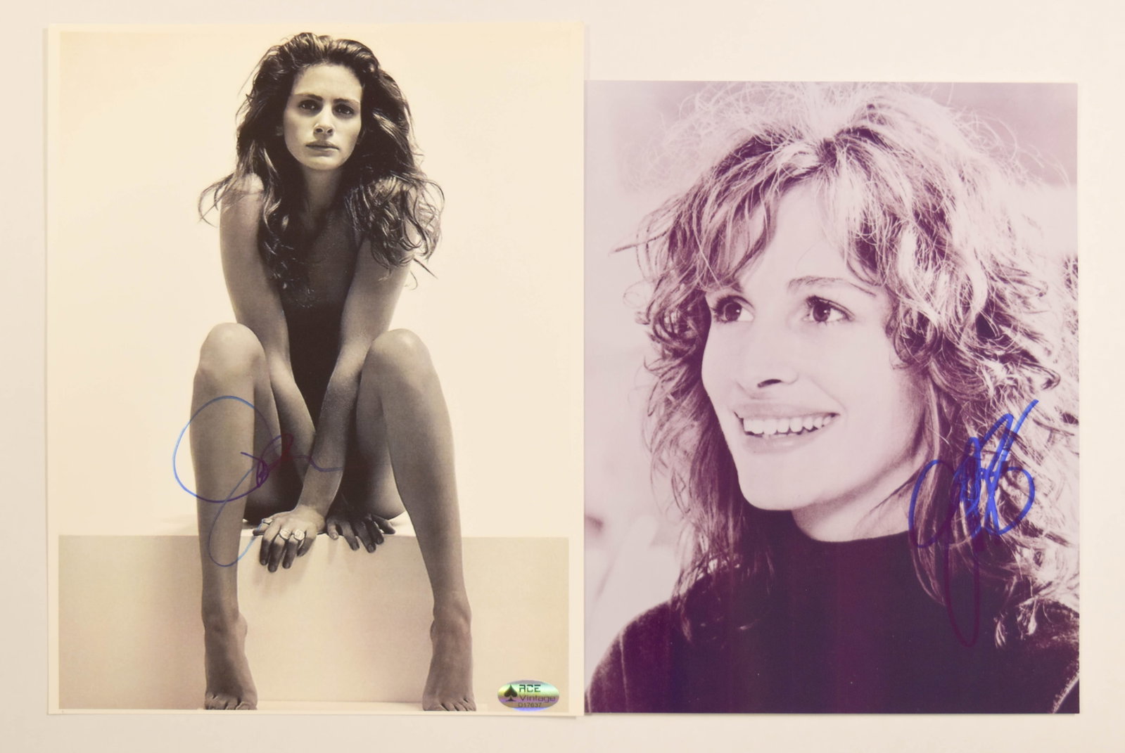 2 Autographed Julia Roberts Photographs with COA: Two autographed photographs featuring Academy Award-winning actress Julia Roberts. The first item is a vertical black and white portrait depicting Roberts seated in a leotard. It bears a bold signatur