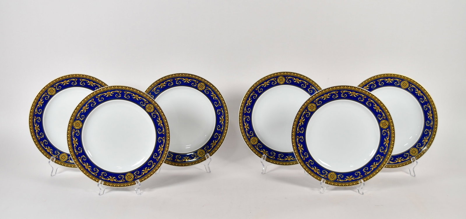 Set of 6 Versace Rosenthal Porcelain Medusa Blue Dinner Plates: Set of six Versace for Rosenthal porcelain dinner plates in the Medusa Blue pattern. Marked on the underside. 10 1/2" diameter. Location: 18B
