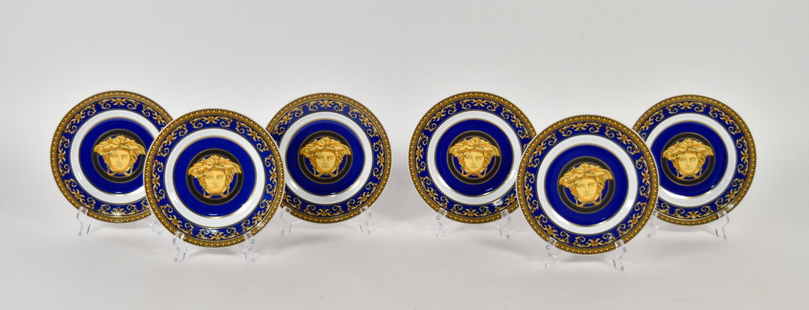 Set of 6 Versace Rosenthal Porcelain Medusa Blue Salad Plates: Set of six Versace for Rosenthal porcelain salad or dessert plates in the Medusa Blue pattern. Each plate is marked on the underside Rosenthal Versace. 7 1/2" diameter. Location: 18D