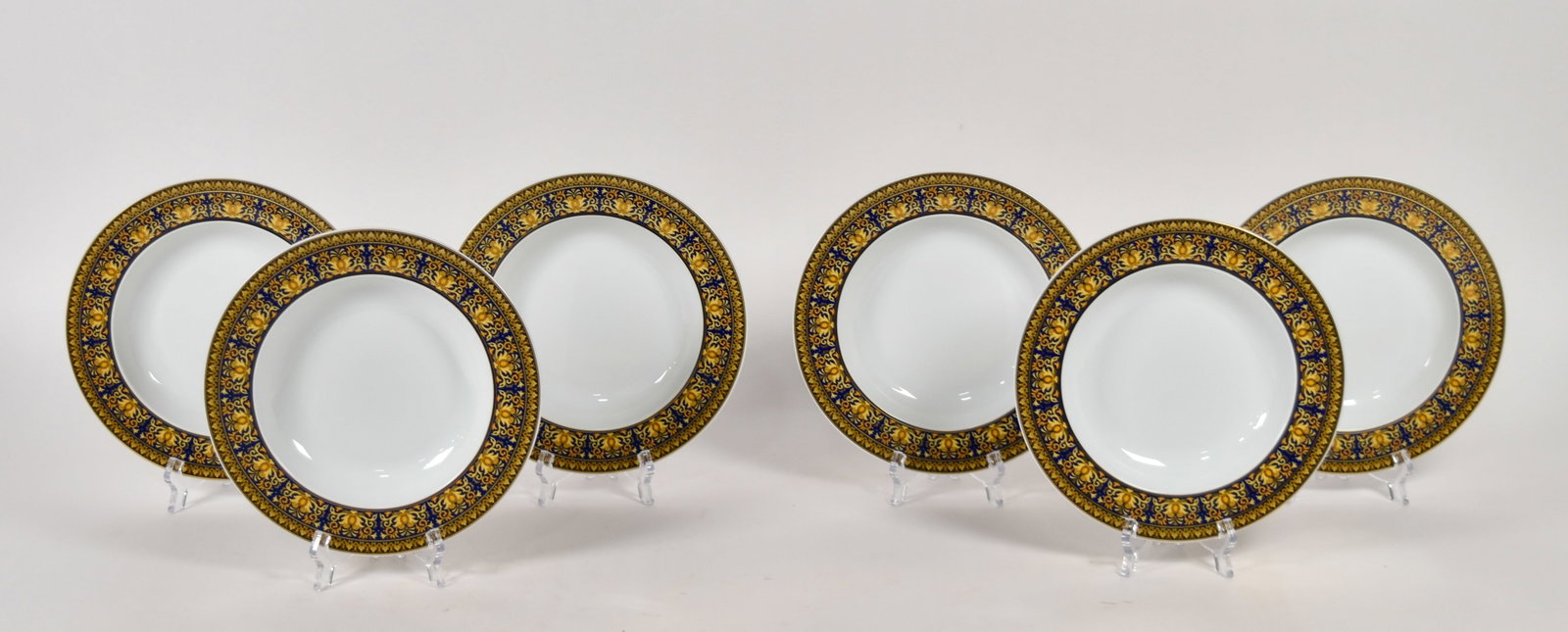 Set of 6 Versace Rosenthal Porcelain Medusa Blue Rimmed Bowls: Set of six Versace for Rosenthal porcelain pasta bowls in the Medusa Blue pattern. Marked on the underside. 1 1/2" H x 9" diameter.
