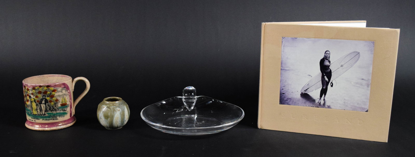 Assortment of 4 Tabletop Items Incl Denbac Art Pottery Vase and Joni Sternbach Photography Book: Four tabletop items comprising a French art pottery vase, an English lustreware mug, a Steuben crystal dish, and a contemporary photography book. The Denbac ovoid stoneware vase features a mottled mat