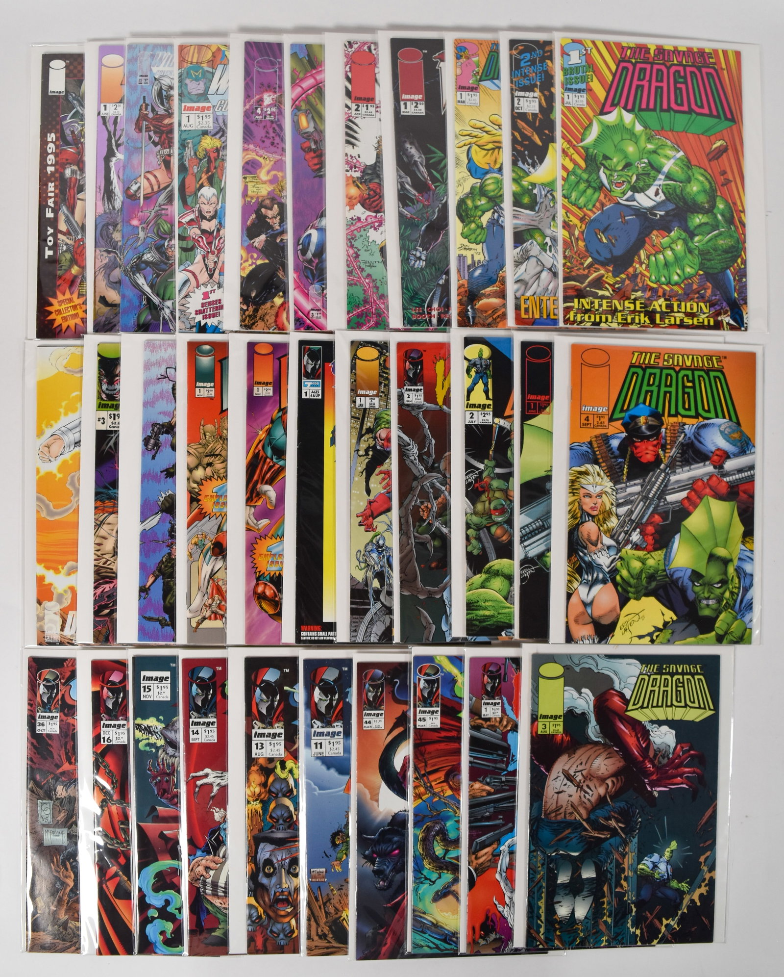 32 Image Comics Including Spawn Savage Dragon and WildC.A.T.S Issues: 32 Image Comics published in the early to mid-1990s. The group features various titles created by Todd McFarlane, Jim Lee, and Erik Larsen. Included are issues of Spawn, The Savage Dragon, and WildC.A